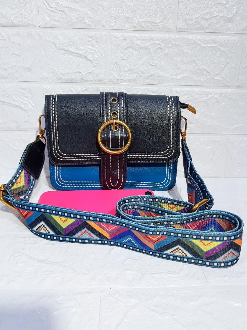 Sling bag shop with colourful strap