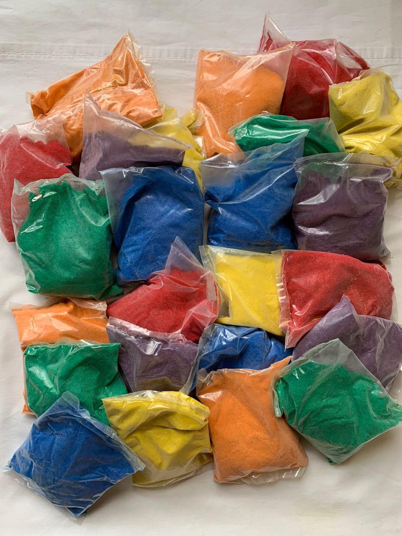 Sand Art Big Bundle (Category: Craft Supplies & Tools) located in Quezon City. Submitted by projectprelovedreloved (Listing ID 1019140655, Image 2). Description: Sand Art Bundle. Bought in the USA. Brand new. Bundle includes the following: 4 sets Activa™️ 6-color sand. 3 lbs of sand per set. Total of 12 Pounds of Sand. 50 pieces Glass bottle charm pendant kit. 1 inch bottles. 12 pieces Dolphin bottle necklace. 12 pieces. Star bottle necklace. 12 