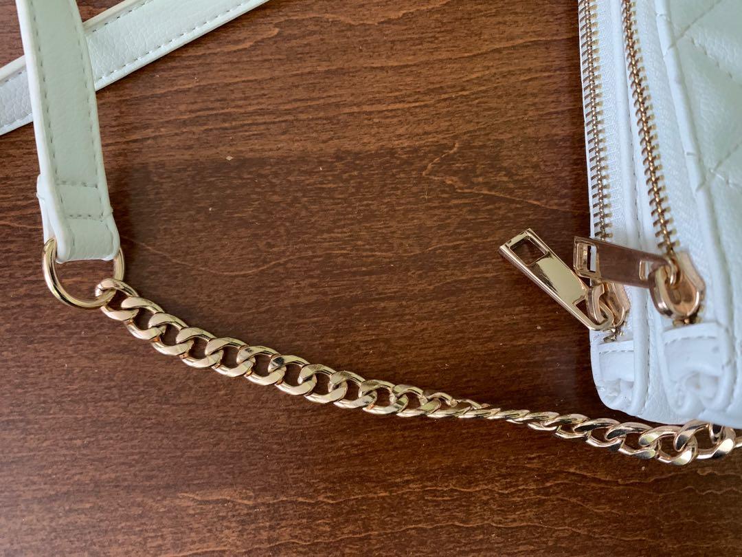 Crossbody bag with chain - Women | MANGO OUTLET USA