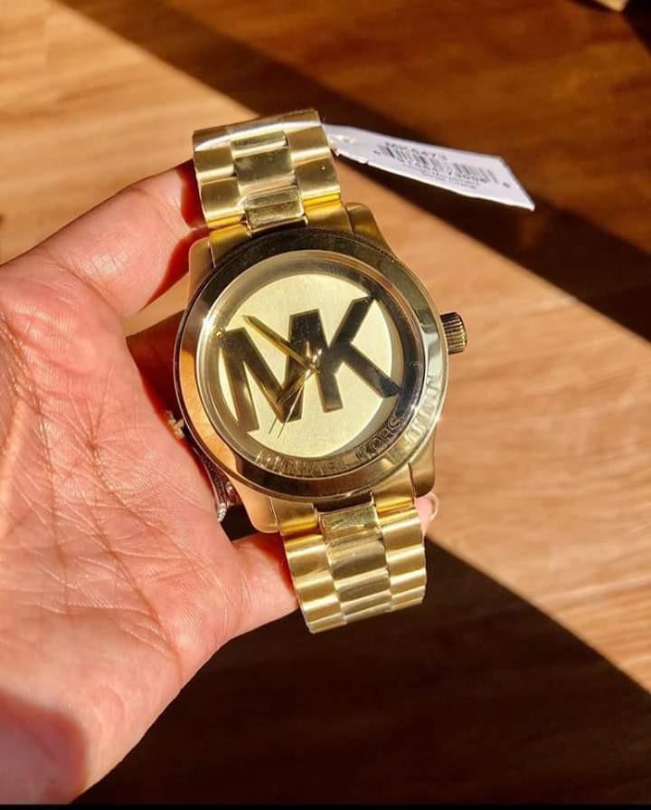 Mk watch logo deals
