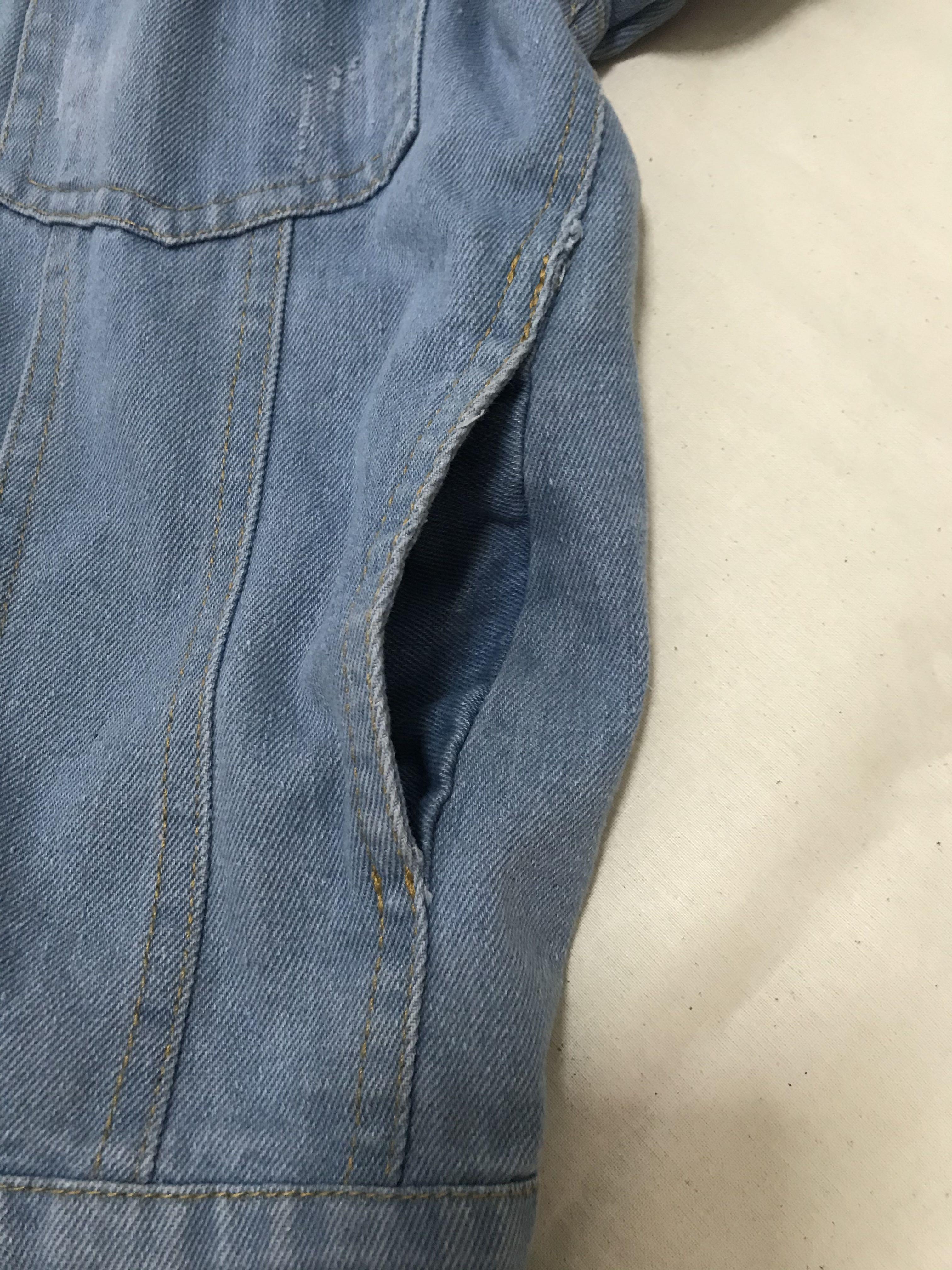 Denim Jacket (Category: Coats, Jackets and Outerwear) located in Singapore. Submitted by daann (Listing ID 1025141721, Image 4). Description: Ptp: 20 inches Length down from pit: 11.5 inches Colour closest to last photo The “scratches” in the 2nd pic is actually the original design. Pockets on the side :) Free nm.