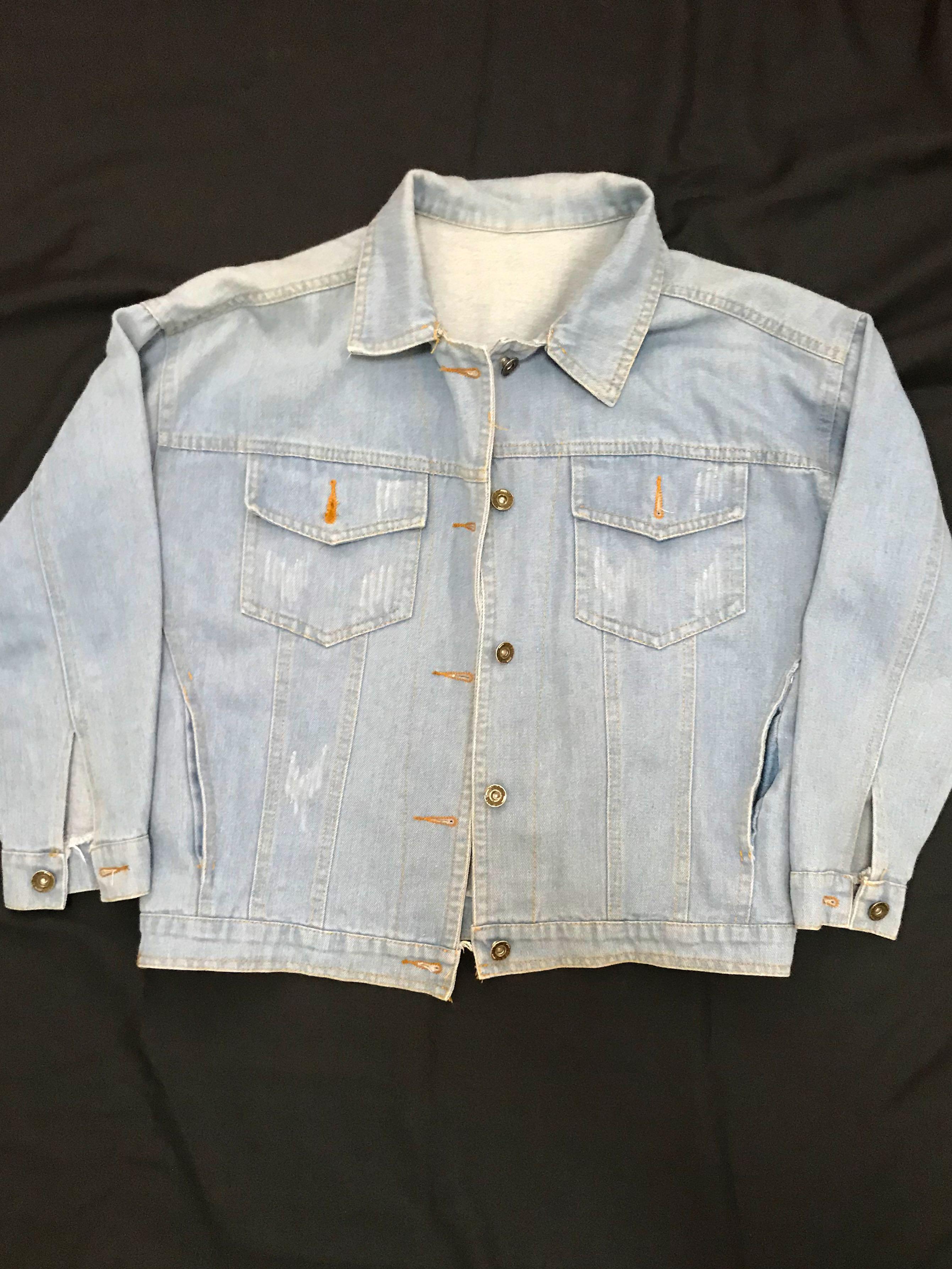 Denim Jacket (Category: Coats, Jackets and Outerwear) located in Singapore. Submitted by daann (Listing ID 1025141721, Image 1). Description: Ptp: 20 inches Length down from pit: 11.5 inches Colour closest to last photo The “scratches” in the 2nd pic is actually the original design. Pockets on the side :) Free nm.