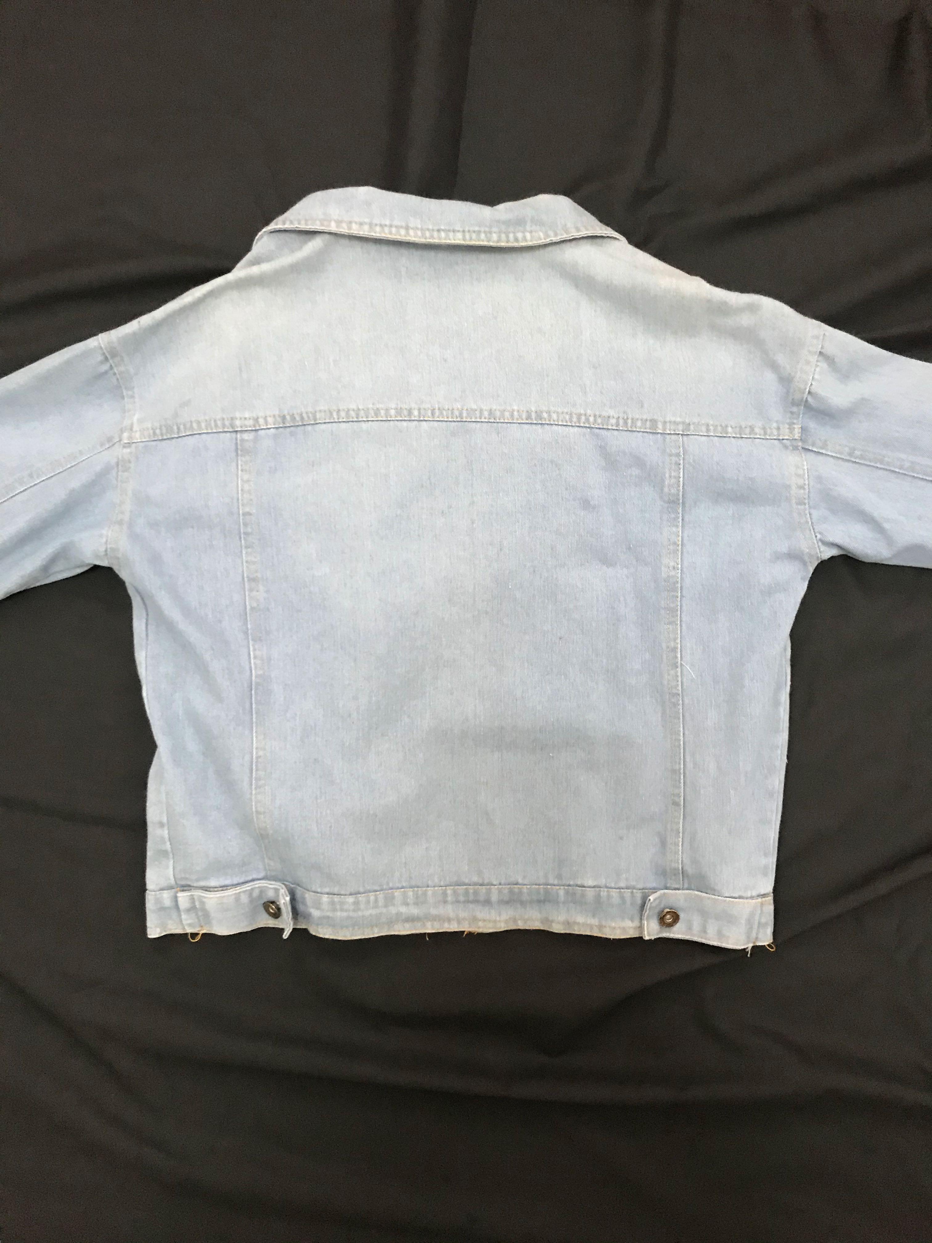 Denim Jacket (Category: Coats, Jackets and Outerwear) located in Singapore. Submitted by daann (Listing ID 1025141721, Image 3). Description: Ptp: 20 inches Length down from pit: 11.5 inches Colour closest to last photo The “scratches” in the 2nd pic is actually the original design. Pockets on the side :) Free nm.