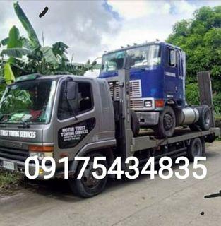 MOTOR TRUST TOWING SERVICES Car carrier Wrecker and Boom Truck