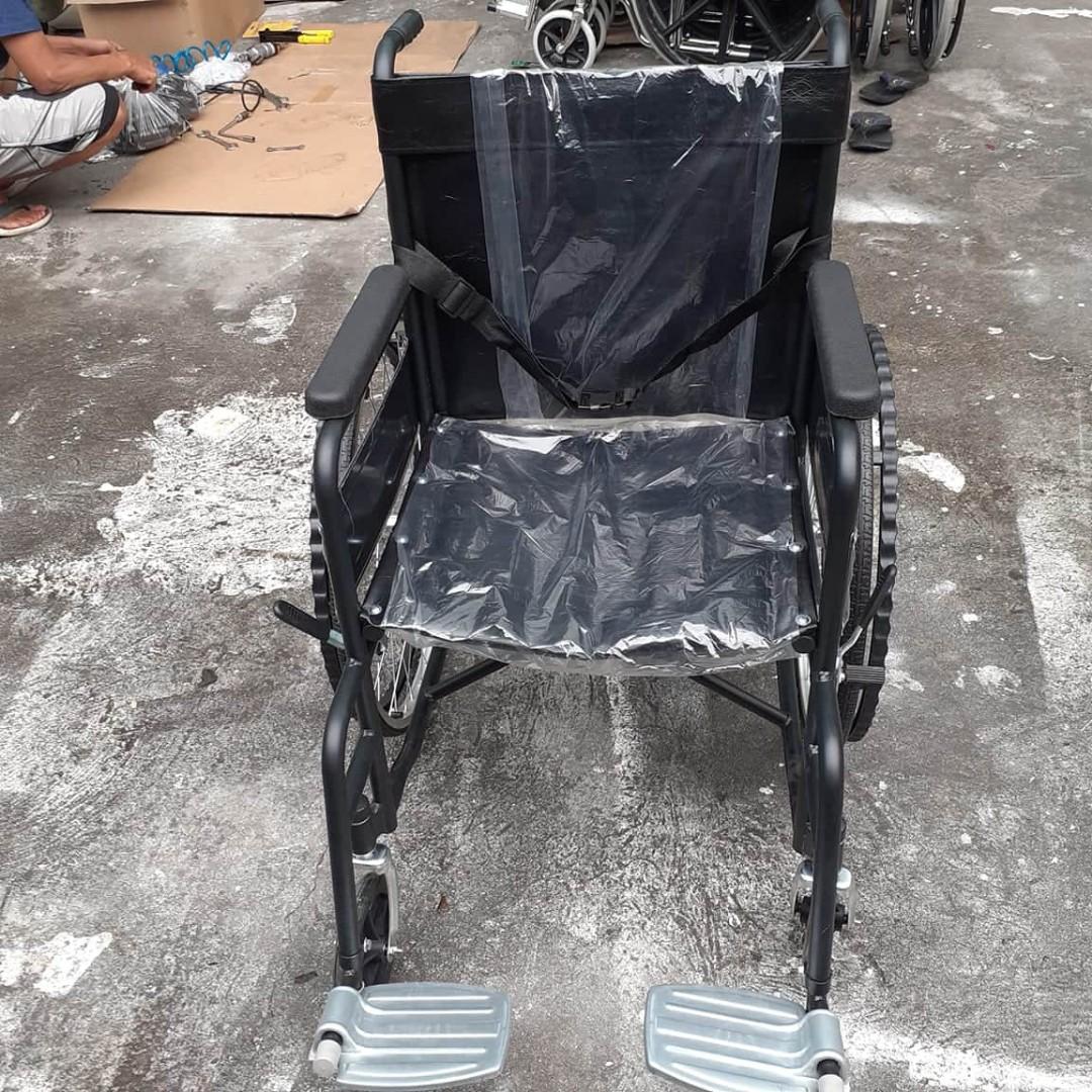 Standard Wheelchair Foldable Black (Category: Rehabilitative Devices) located in Manila. Submitted by theunoshop (Listing ID 1025232922, Image 3). Description: * Foldable Wheelchair easy to load onto cars or store away * Heavy Duty * Full sized standard * Arm rest, Leg support and Foot rest * Leather design for easy cleaning * Black powder coated steel body and wheels * Seat Width - 47cm * Seat Height from the Floor - 49cm.