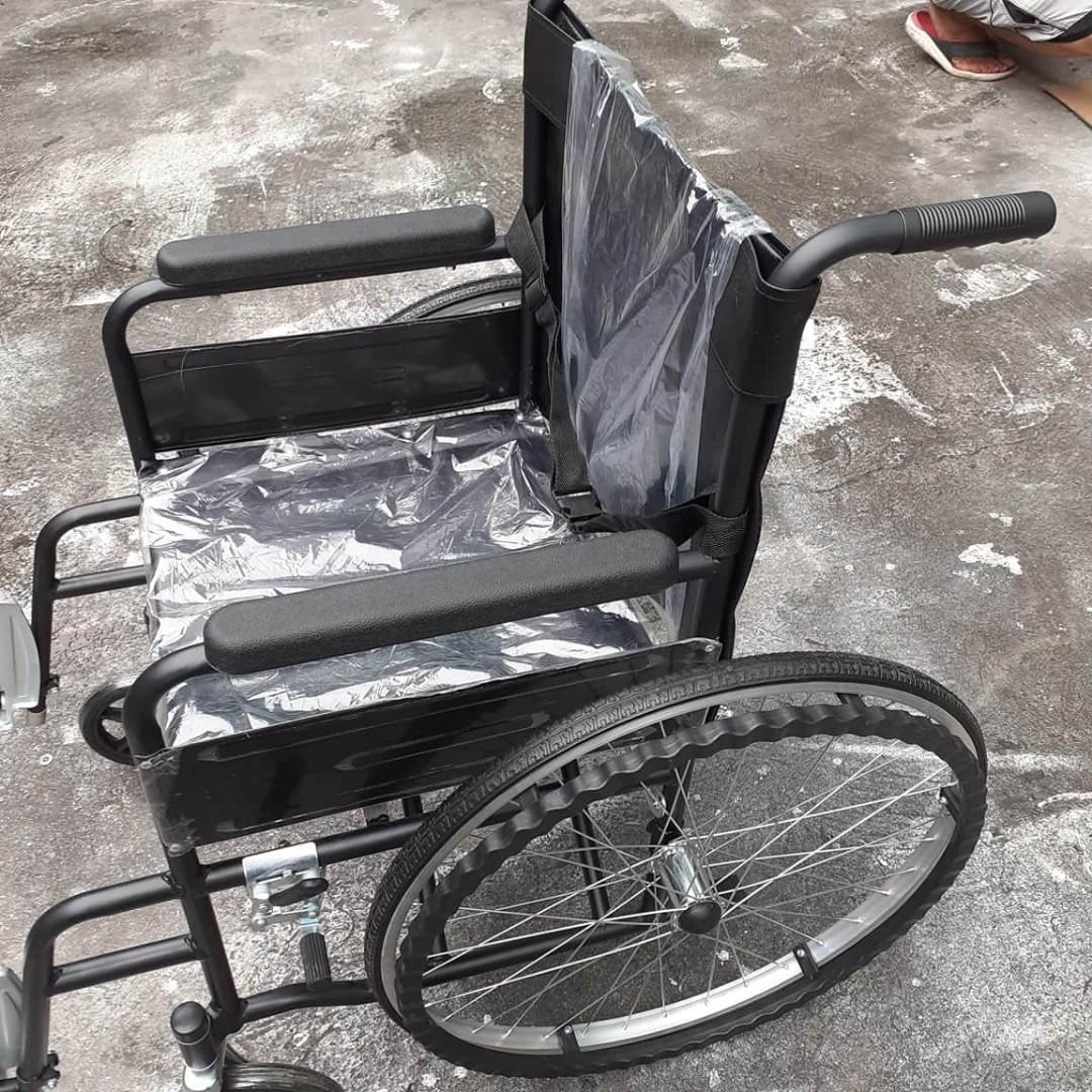 Standard Wheelchair Foldable Black (Category: Rehabilitative Devices) located in Manila. Submitted by theunoshop (Listing ID 1025232922, Image 2). Description: * Foldable Wheelchair easy to load onto cars or store away * Heavy Duty * Full sized standard * Arm rest, Leg support and Foot rest * Leather design for easy cleaning * Black powder coated steel body and wheels * Seat Width - 47cm * Seat Height from the Floor - 49cm.