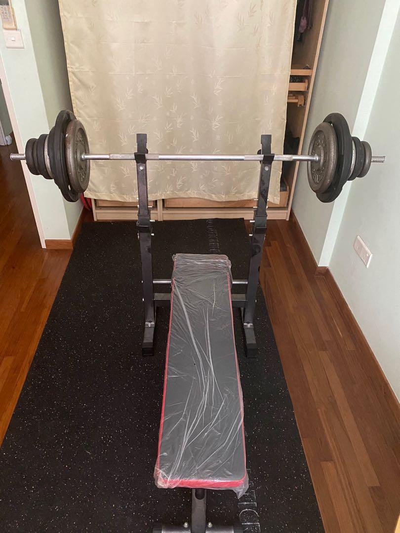Bench Press Together With Two Bars And Weights 50 Kg Sports Weights Gym Equipment On Carousell