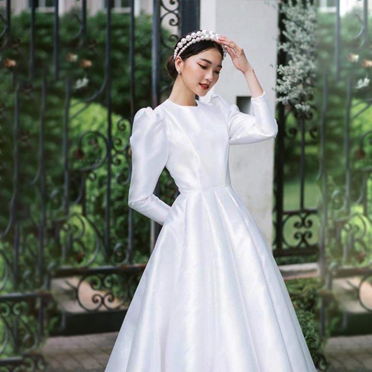 Full sleeve white gown 2025