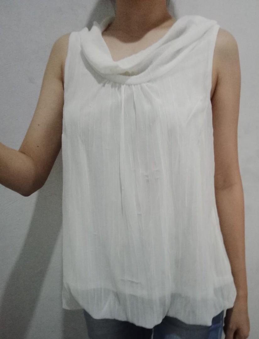 white flowy sleeveless top