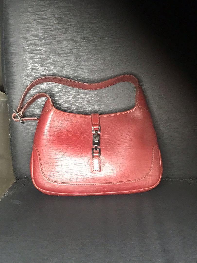 Authentic Gucci mini hobo bag (Category: Luxury Bags & Wallets) located in Quezon City. Submitted by zhoobag (Listing ID 1027551360, Image 1). Description: Authentic preowned Gucci mini hobo bag in dark red textured leather.