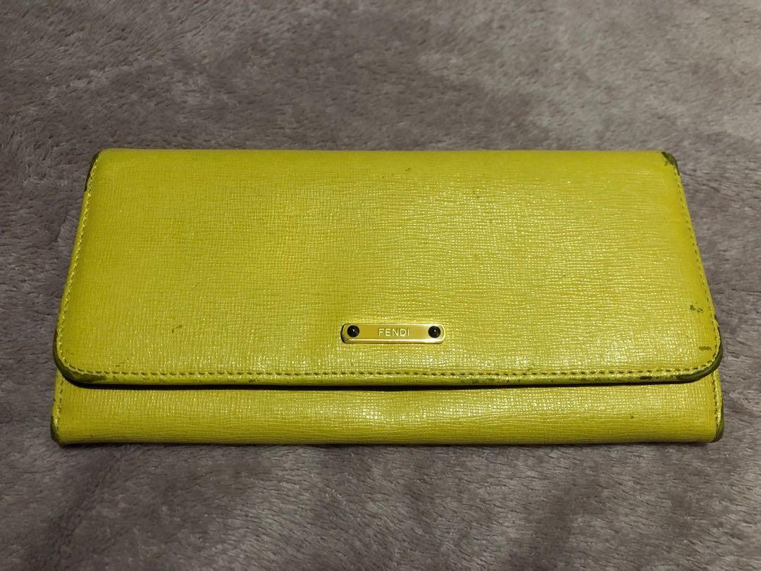 Fendi long wallet in yellow (Category: Luxury Bags & Wallets) located in San Pedro. Submitted by allenaaa (Listing ID 1027696289, Image 1). Description: Fendi long wallet in yellow. Rfs: Decluttering Flaws can seen on the posted pics. Corner scuffing. .