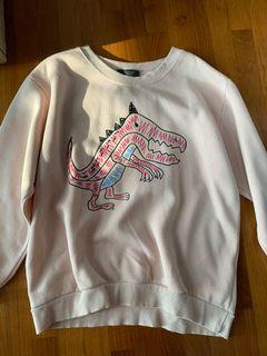Pink pullover dinosaur top