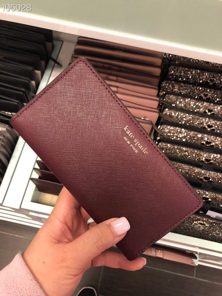 Kate spade cameron large slim bifold wallet sales
