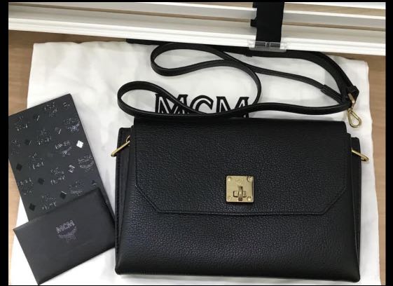 Mcm clutch black sales