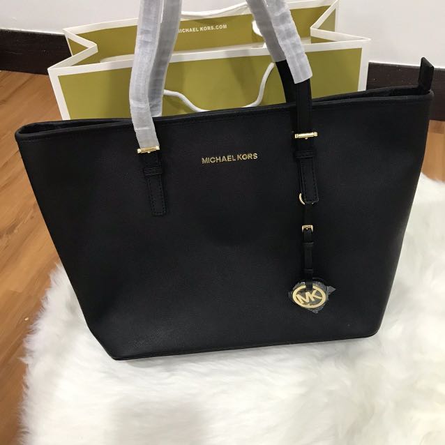 Michael Kors jet set tote bag signature mk yellow brown, Women's Fashion,  Bags & Wallets, Shoulder Bags on Carousell