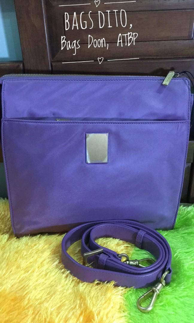 Preloved bags (Category: Cross-body Bags) located in Manila. Submitted by bdbdatbp (Listing ID 1027940136, Image 1). Description: New. Ube color 💜super maganda. Na kakain love ❤️.