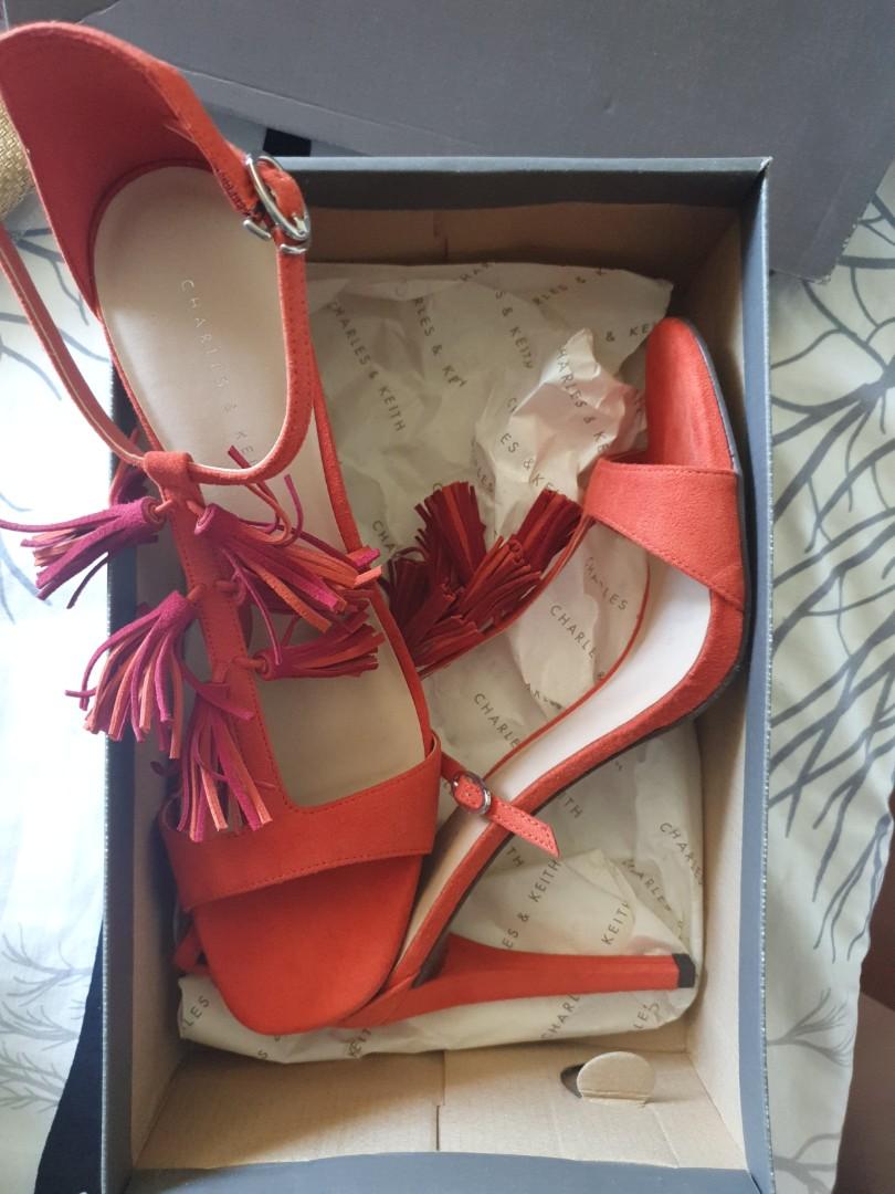 Red heels with tassels on sale
