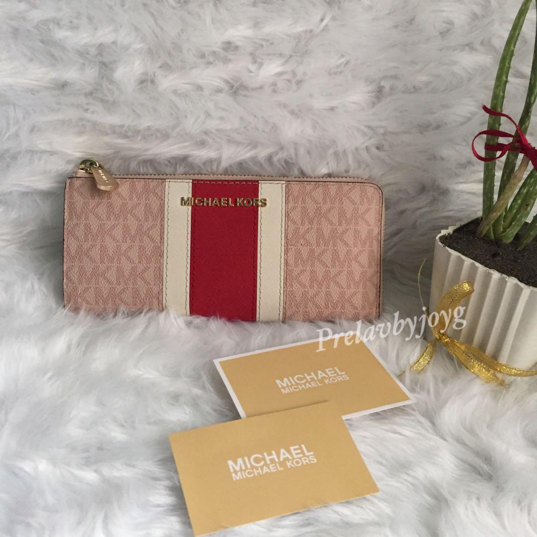 Tory burch vs michael kors wallet clearance