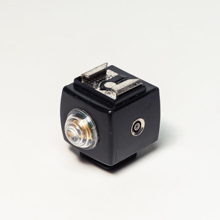 Optical Flash Slave Trigger with PC Socket (Category: Other Photography Accessories) located in Singapore. Submitted by martinboon (Listing ID 1028098684, Image 1). Description: Optical triggers can be a great additional accessory to your studio. They provide you with the ability to trigger your Speedlight using another flash or strobe light. This optical slave trigger with a built-in tripod socket is designed to work with portable flash units th