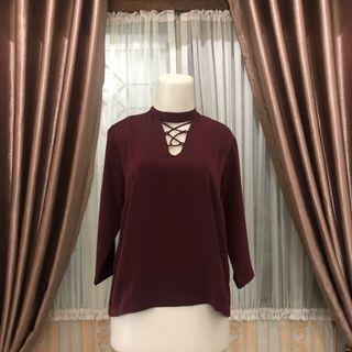 The executive maroon top