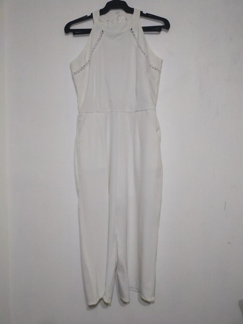 white sleeveless romper