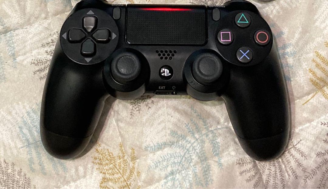 PS4 Controller (Category: Controllers) located in Singapore. Submitted by sg.made.iyg (Listing ID 1028635765, Image 1). Description: Original PS4 controller. I bought another controller coloured so no use for this controller.