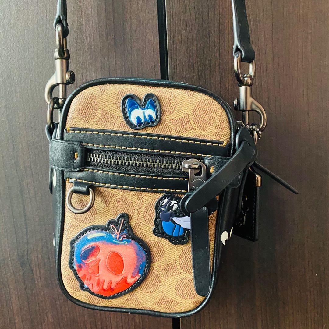 coach x disney sling bag