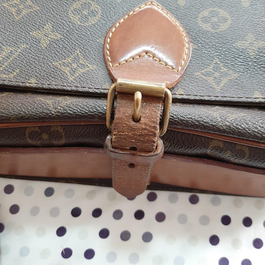 Louis Vuitton Cartoucheire GM (Category: Purses & Pouches) located in Quezon City. Submitted by liambambam (Listing ID 1028733687, Image 2). Description: Louis Vuitton LV Cartouchiere GM Authentic Preloved with signs of usage - dry closure tab, creases, minor cracks in flap area, pls see photos Cleaned with Lovin my Bags leather conditioner.