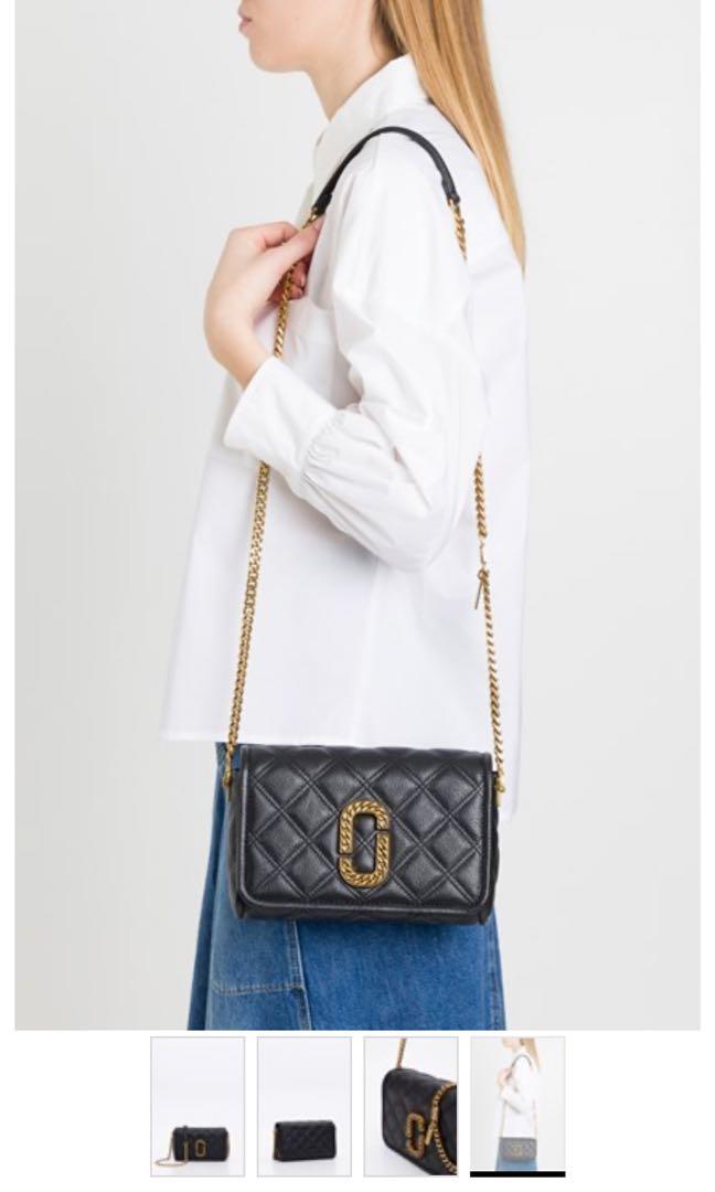 the status flap crossbody bag