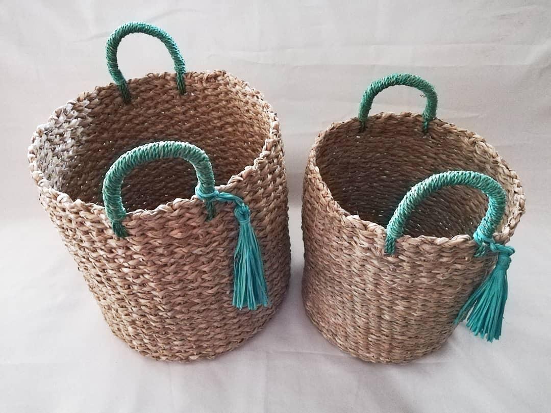 Native Baskets with Handles and Tassels (Category: Laundry Baskets) located in Las Pinas. Submitted by chelhq (Listing ID 1028681454, Image 2). Description: ROUND CYLINDRICAL BASKETS WITH GREEN HANDLES/TASSELS made of seagrass Multi-purpose - may be used as organizational basket, hamper or planter. Small 10"x11" - P650/pc Medium 12"x12" - P700/pc Large - SOLD.