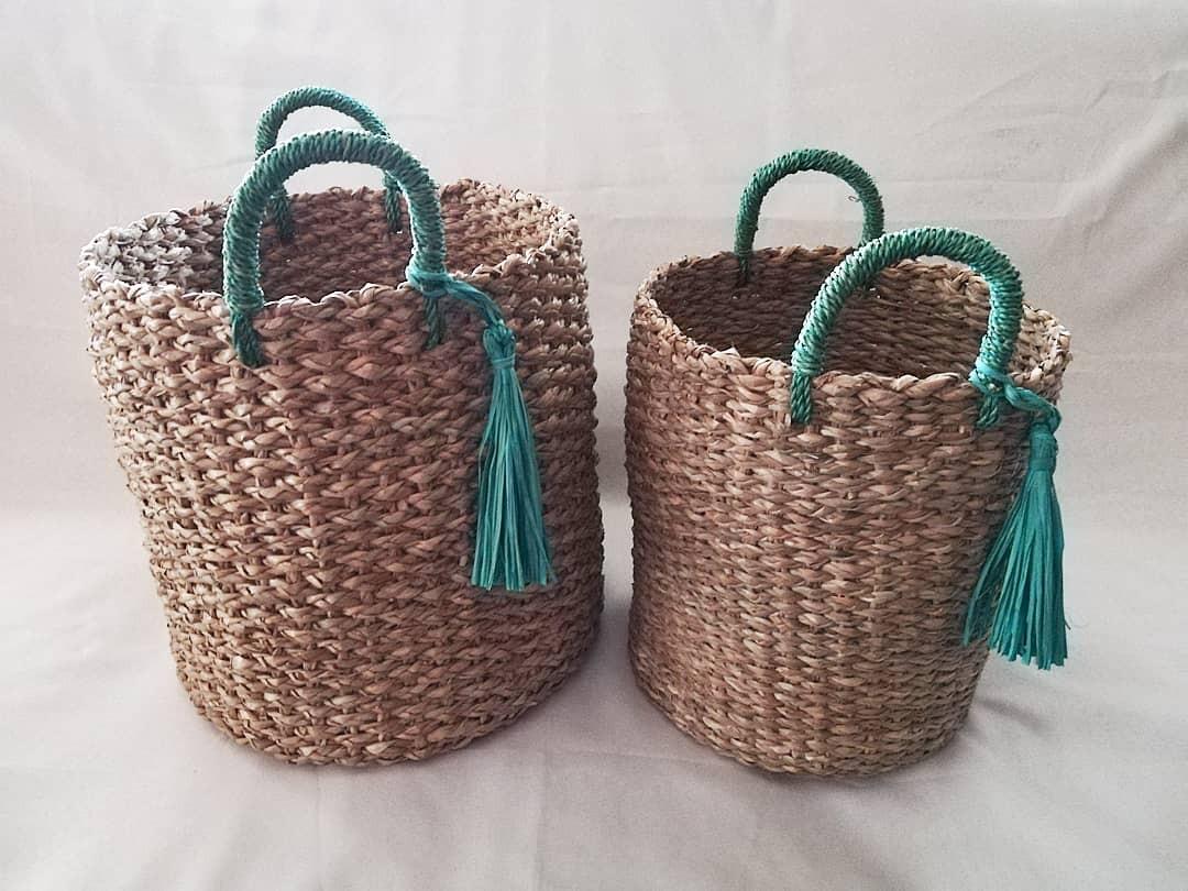 Native Baskets with Handles and Tassels (Category: Laundry Baskets) located in Las Pinas. Submitted by chelhq (Listing ID 1028681454, Image 1). Description: ROUND CYLINDRICAL BASKETS WITH GREEN HANDLES/TASSELS made of seagrass Multi-purpose - may be used as organizational basket, hamper or planter. Small 10"x11" - P650/pc Medium 12"x12" - P700/pc Large - SOLD.