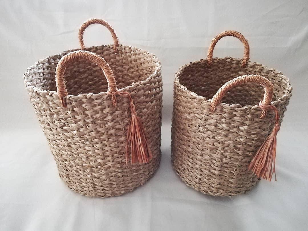 Native Baskets with Handles and Tassels (Category: Laundry Baskets) located in Las Pinas. Submitted by chelhq (Listing ID 1028681766, Image 1). Description: ROUND CYLINDRICAL BASKETS WITH ORANGE/COPPER HANDLES/TASSELS made of seagrass Multi-purpose - may be used as organizational basket, hamper or planter. Small 10"x11" - P650/pc Medium 12"x12" - P700/pc Large - SOLD.