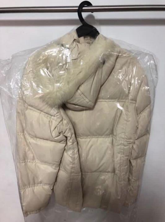 Winter Jacket (Category: Coats, Jackets and Outerwear) located in Singapore. Submitted by fuchsiabella (Listing ID 1028901007, Image 2). Description: Winter jacket used for 1 trip to Paris. Never worn after that because husband lost weight. Colour: Beige/Cream White Condition: 9/10 ***Not for fussy buyers!!! ***Strictly no low ballers!!!.