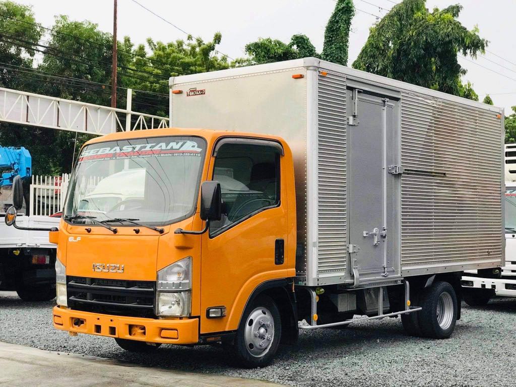 photo 4 Wheeler Isuzu Elf Closed Van 2020 isuzu elf closed van 14ft 4jj1