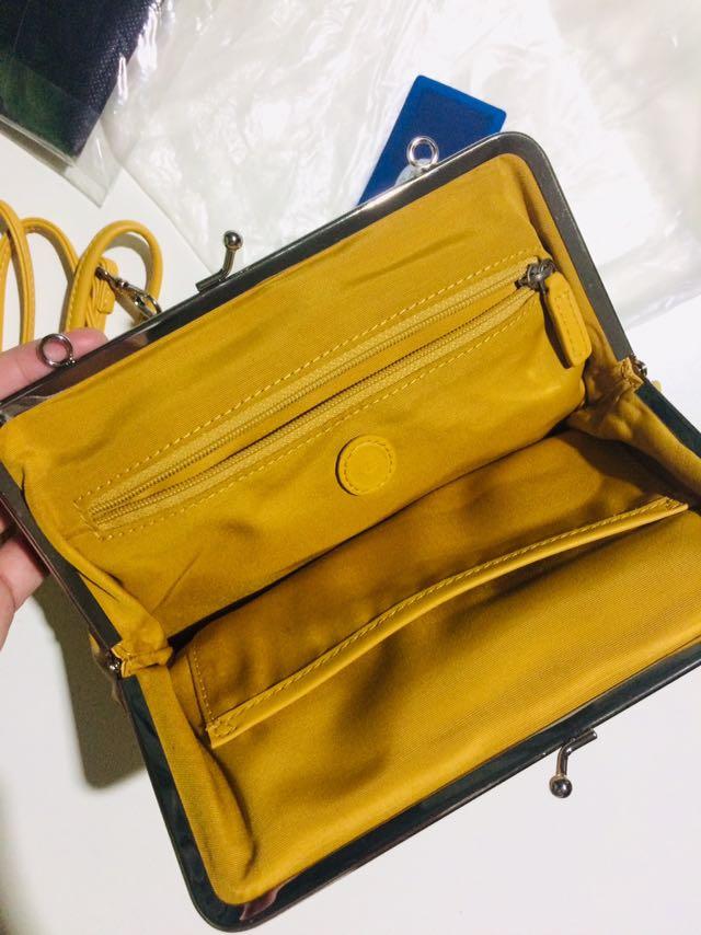 Claps Sling Bag BNWT (Category: Cross-body Bags) located in Tarlac. Submitted by personal_preloved_declutter (Listing ID 1029165619, Image 2). Description: Given as a gift never been used. .