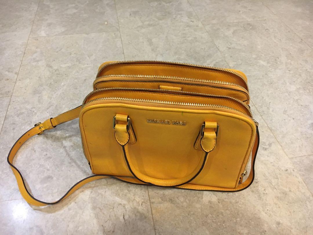 mk yellow sling bag