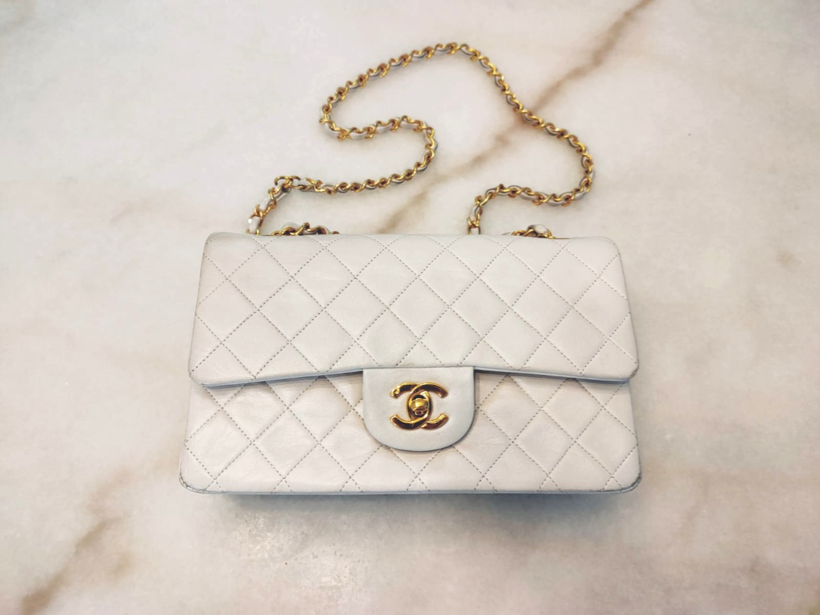 Vintage Chanel Classic Flap White, Women's Fashion, Bags & Wallets,  Shoulder Bags on Carousell