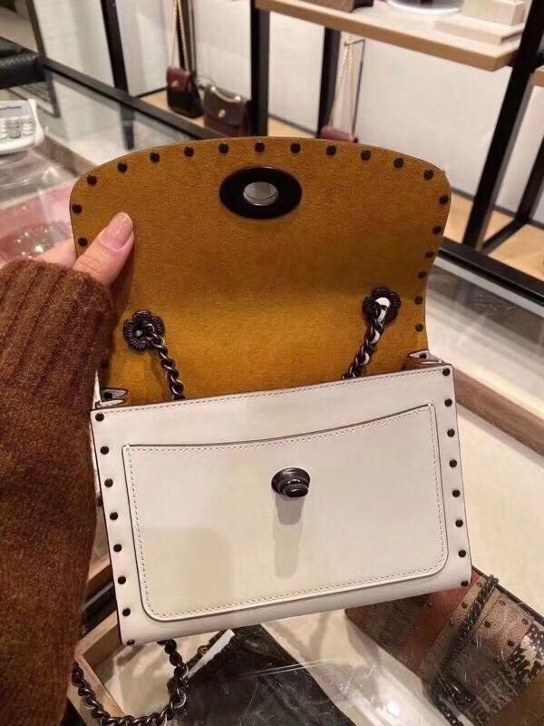 Coach parker best sale size