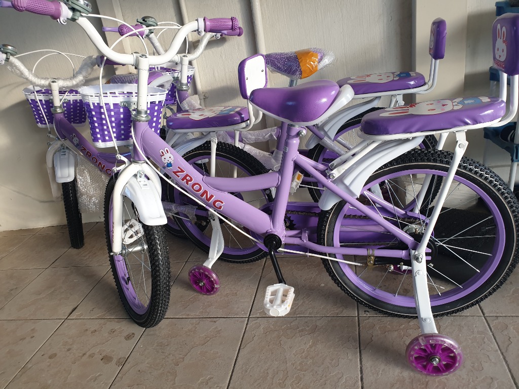 boy and girl on bicycle