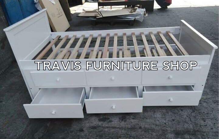 Wooden Bed Frame w/ Pull Out (Category: Bed Frames & Mattresses) located in Manila. Submitted by travisfurnitureshop (Listing ID 1029208884, Image 1). Description: Wooden Bed Frame w/ Pull Out Model: Captain w/ 3 Drawers Dimension: 36"x75" Pull out 36" Color: White.