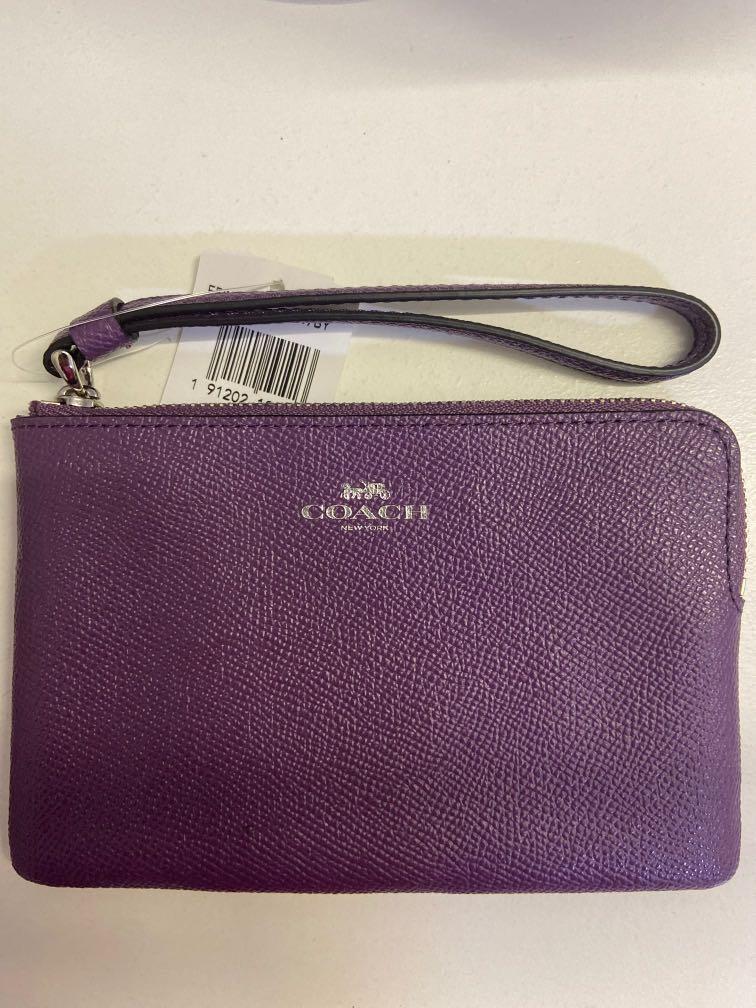 Purple coach wristlet new arrivals