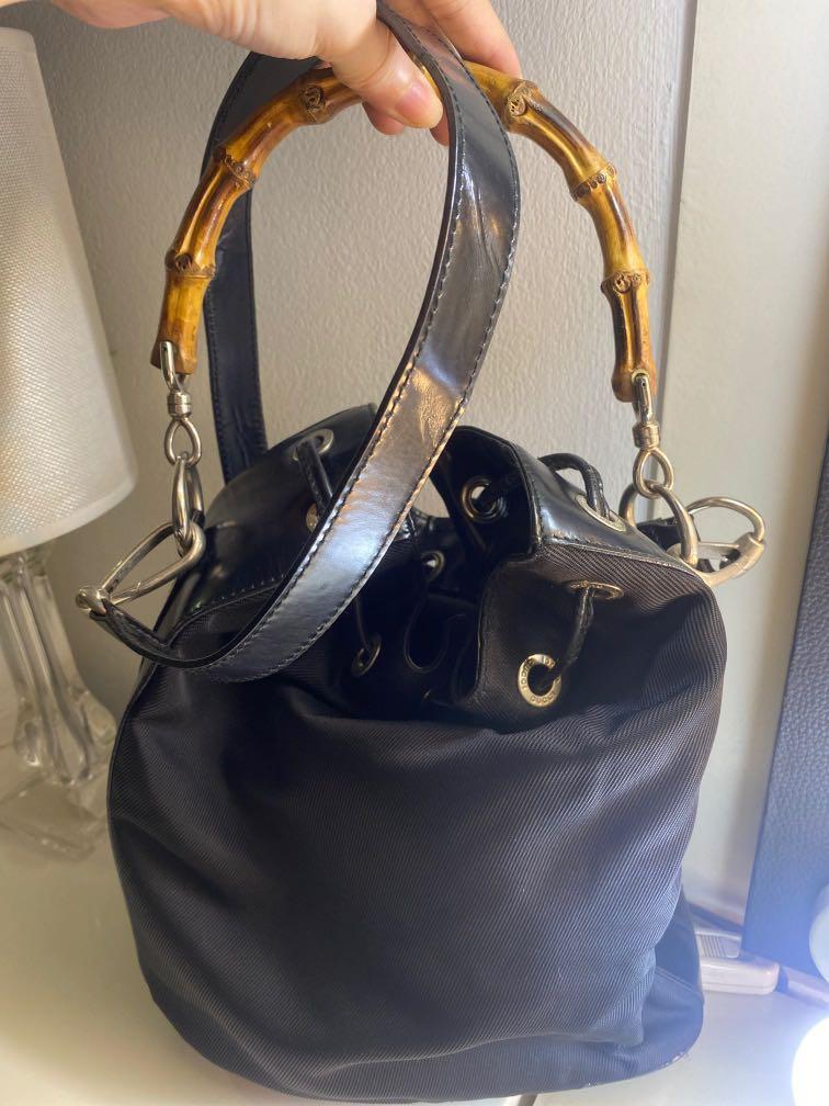 Gucci (Category: Purses & Pouches) located in Quezon City. Submitted by decluttermnl (Listing ID 1029514323, Image 3). Description: Gucci bucket bag with bamboo handle .