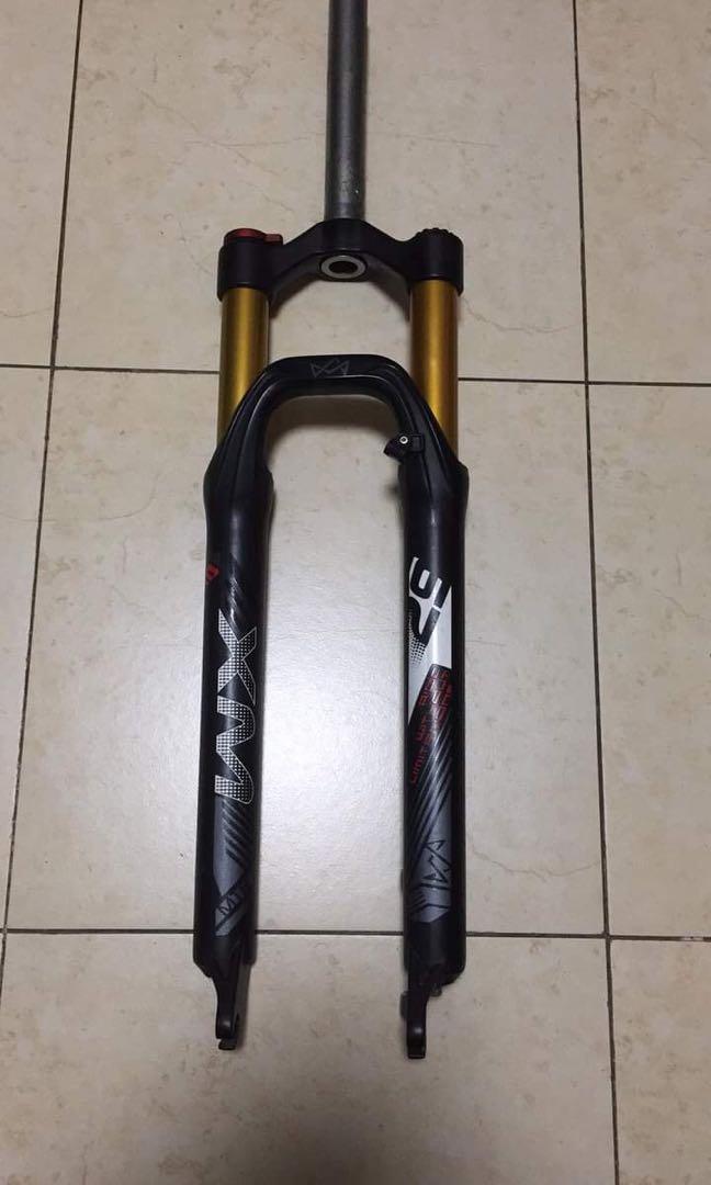 Coil clearance type fork