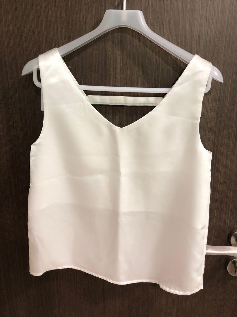 white satin sleeveless top