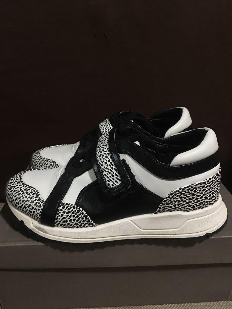 Charles & Keith - Black and White Rubber 36 With ISSUE (Category: Sneakers) located in Manila. Submitted by ap120924 (Listing ID 1025443220, Image 1). Description: Authentic Charles and keith womens rubber shoes. Bought abroad. With flaws due to storage. Offer your price nalang po if bet pa.