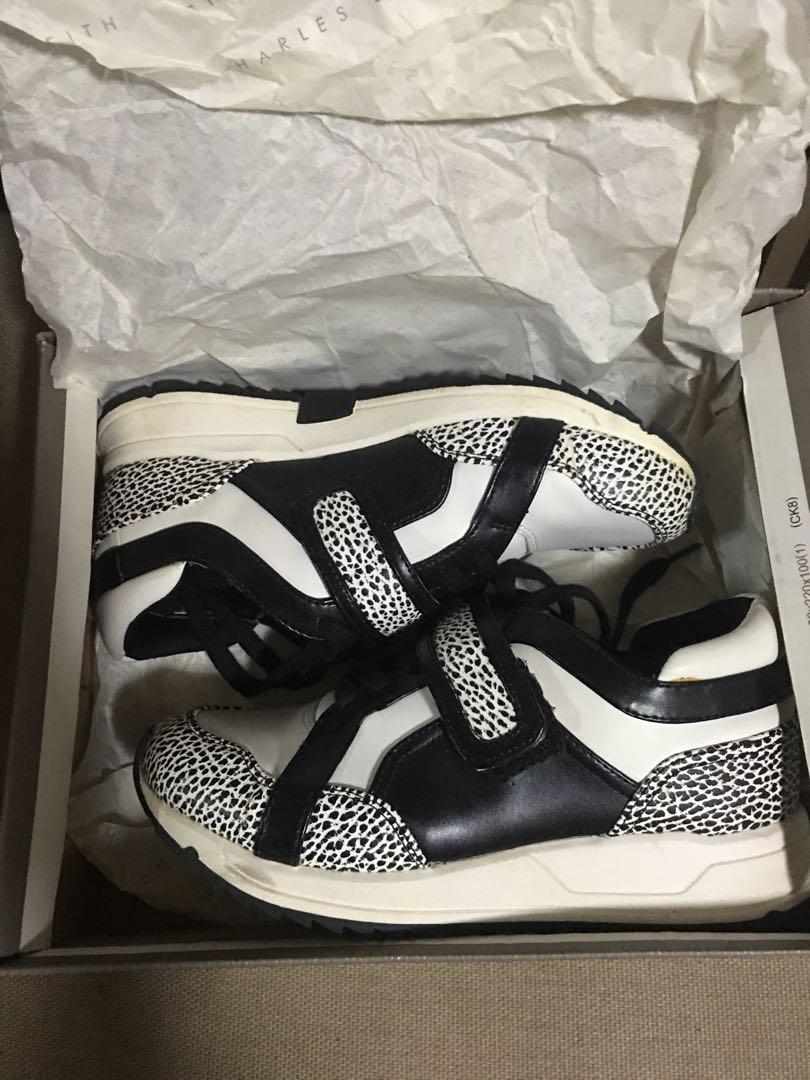 Charles & Keith - Black and White Rubber 36 With ISSUE (Category: Sneakers) located in Manila. Submitted by ap120924 (Listing ID 1025443220, Image 2). Description: Authentic Charles and keith womens rubber shoes. Bought abroad. With flaws due to storage. Offer your price nalang po if bet pa.