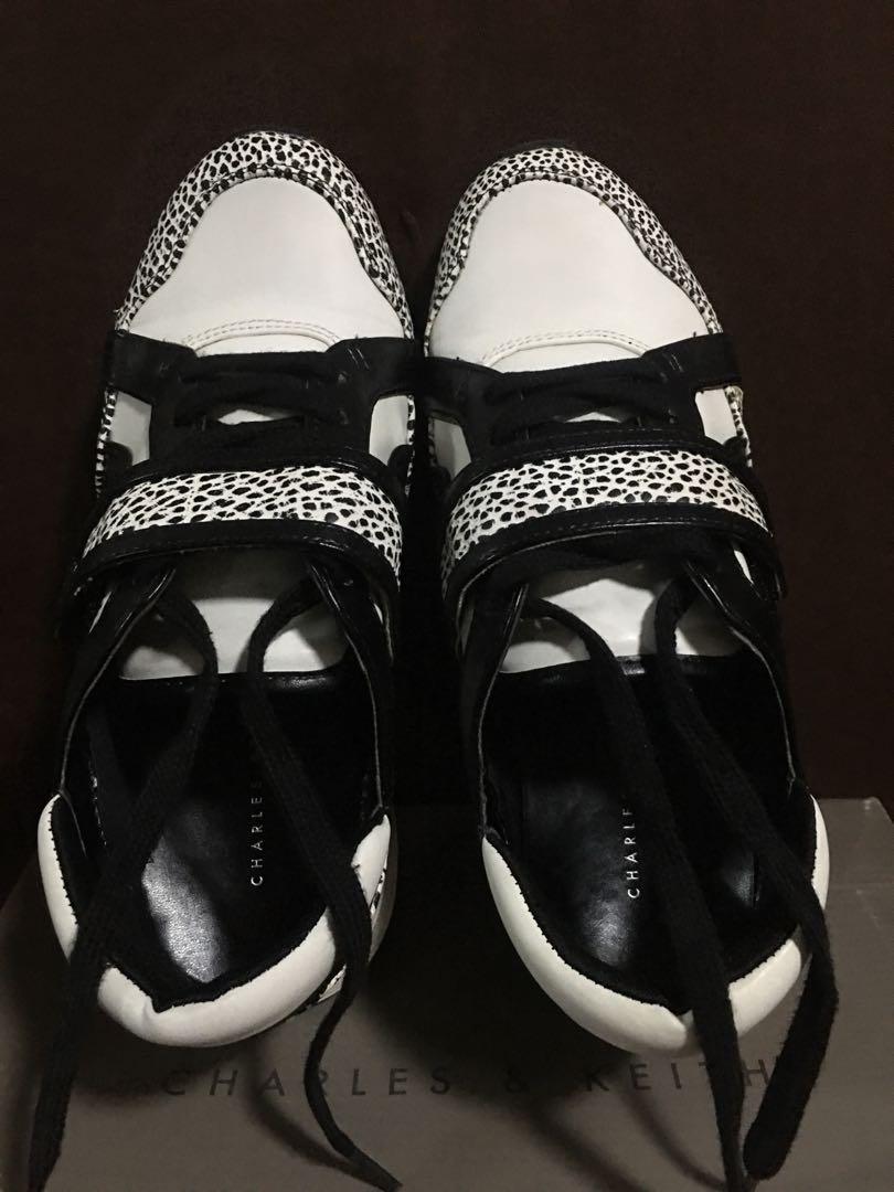 Charles & Keith - Black and White Rubber 36 With ISSUE (Category: Sneakers) located in Manila. Submitted by ap120924 (Listing ID 1025443220, Image 3). Description: Authentic Charles and keith womens rubber shoes. Bought abroad. With flaws due to storage. Offer your price nalang po if bet pa.