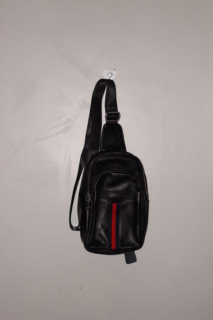 Genuine Leather Crossbody Bag Black (Category: Sling Bags) located in Manila. Submitted by ted6875 (Listing ID 1025537724, Image 1). Description: This bag was purchased in Bangkok, Thailand and has never been used. It’s perfect for carrying all your essentials and more. Details: •crossbody bag •genuine cowhide leather •black •contrast ribbon panel detail •adjustable •switchable sling positioning •external zip pocket •shipping will be carried by b