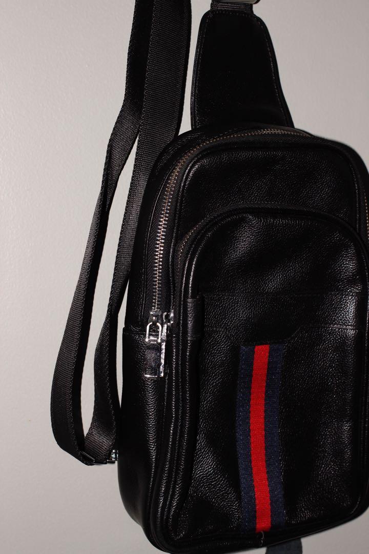 Genuine Leather Crossbody Bag Black (Category: Sling Bags) located in Manila. Submitted by ted6875 (Listing ID 1025537724, Image 2). Description: This bag was purchased in Bangkok, Thailand and has never been used. It’s perfect for carrying all your essentials and more. Details: •crossbody bag •genuine cowhide leather •black •contrast ribbon panel detail •adjustable •switchable sling positioning •external zip pocket •shipping will be carried by b