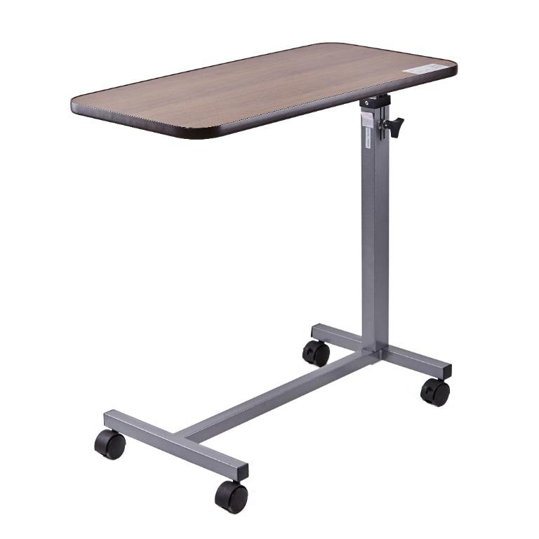 Bedside Table (Category: Tables & Sets) located in Singapore. Submitted by medicalassistance4u (Listing ID 1002421631, Image 3). Description: The Bedside Table is portable and allow user to have their daily routine activity done on a desk. It come with 4 wheels for easy maneuver. It has an adjustable height which caters to the different needs of user. It can be use at different location etc. beds, sofa, chairs Features - Easily moveable with whee